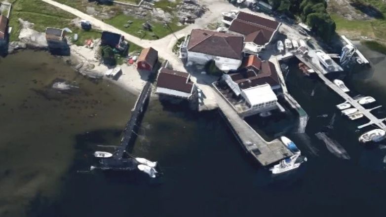 Norwegian Ferry Overshoots Pier and Hits Old Post Office